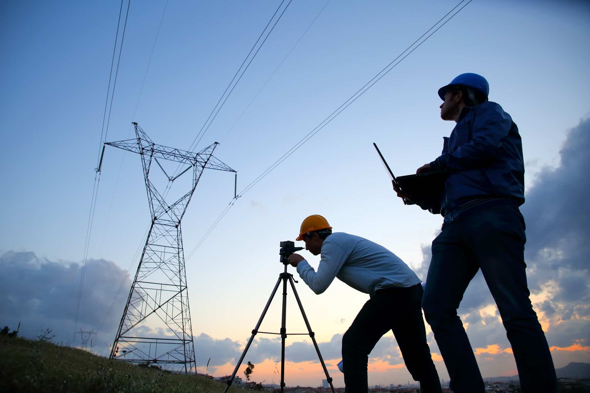Engineer workers at electricity station